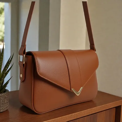 Bolsa feminina baguete de ombro com detalhes em dourado