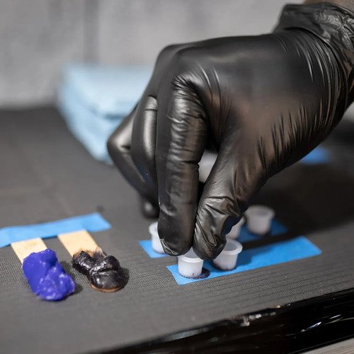 Luvas descartáveis antiderrapantes Talge Luva Nitrílica cor preto tamanho G de nitrila x 100 unidades